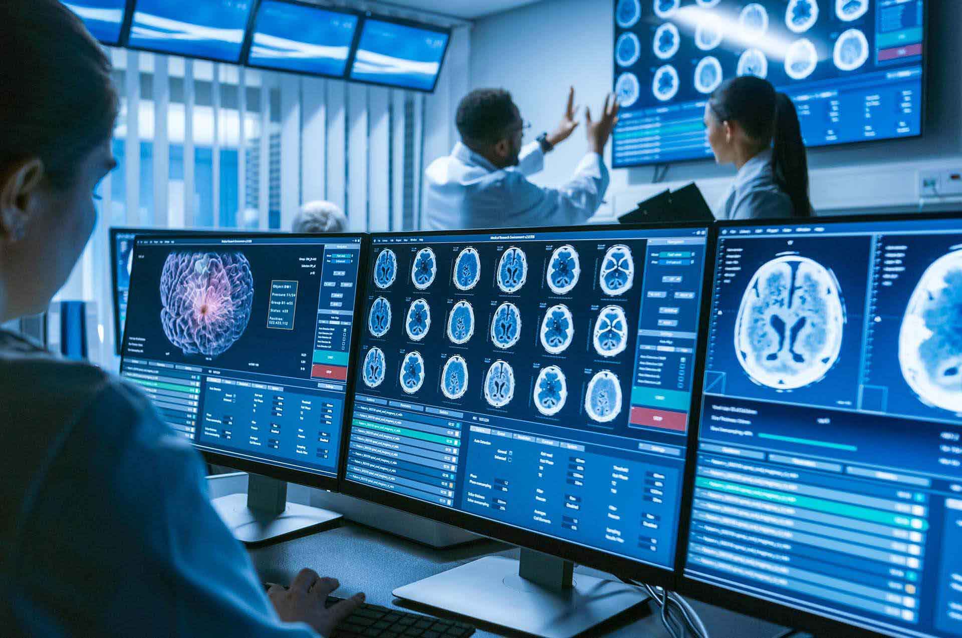 Clinicians reviewing AI-assisted medical imaging